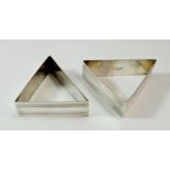 A pair of triangular sterling silver napkin rings, 60g