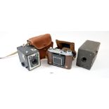Three vintage cameras