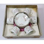 A Limoges set of 1950's coffee cans and saucers in original box