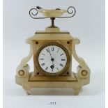 A 19th century alabaster mantel clock with scoll brackets, 24cm tall