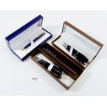 Two Cross boxed sets of ballpoint and fountain pens and a Waterman's boxed ballpoint pen