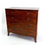 A mahogany chest of two short and three long drawers on swept supports, 107 x 52 x 102 cm