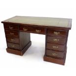 A twin pedestal desk, 135 x 59 cm