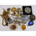 A box of vintage costume jewellery