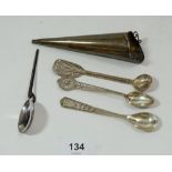 Three white metal decorative filigree spoons and a silver posy holder, Birmingham 1911, 75g, etc.