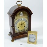 A mahogany cased mantel clock, 25cm tall and a small brass 'Swiza' clock