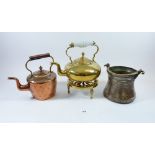 A group of copper and brass including kettle with glass handle