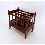 A reproduction mahogany canterbury magazine rack