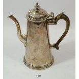 An early George II silver coffee pot, London circa 1730 (marks rubbed), 777g, 24cm tall