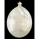 A large mother of pearl shell pendant carved The Last Supper
