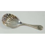 A silver caddy spoon with shell terminal, 1993 by Richards & Knight