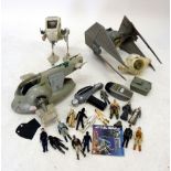 A box of Star Wars figures and equipment including AtAt walker etc.