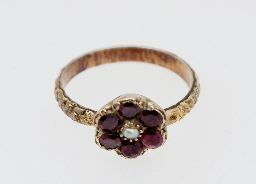 A Victorian yellow metal ring of flower form set amethyst and seed pearl, the shank with floral cast - Image 3 of 5