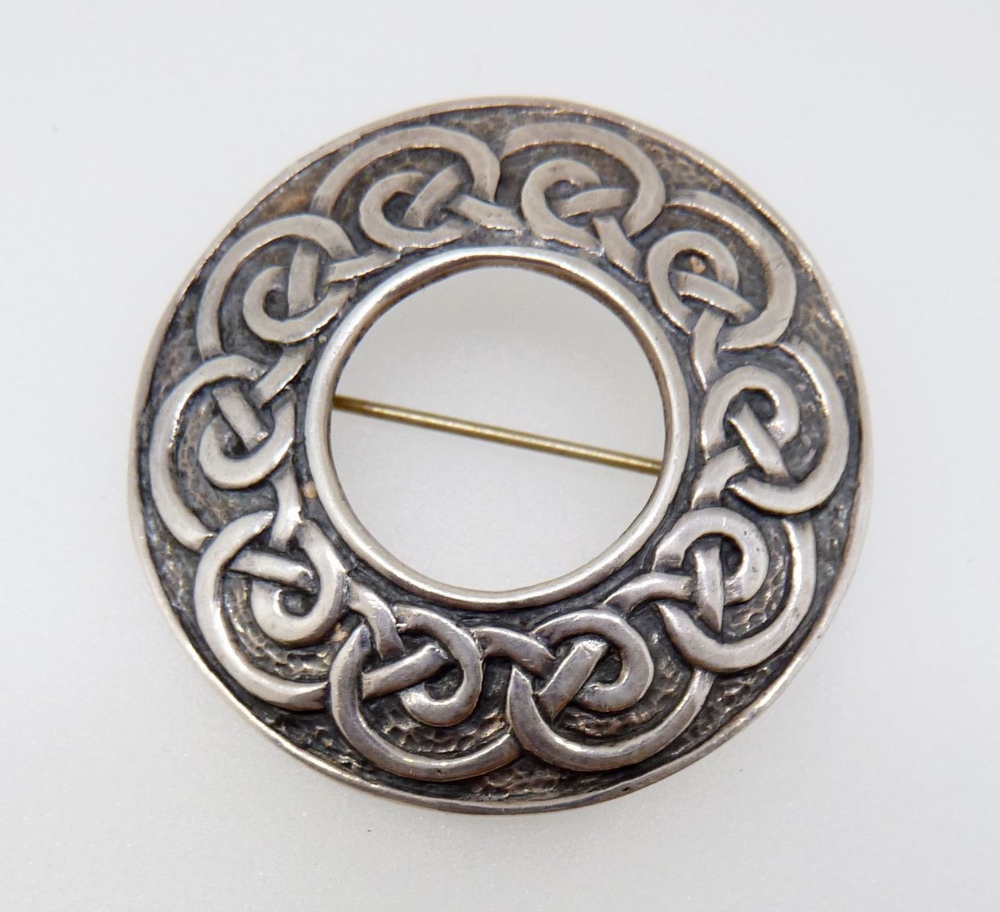 A Celtic Iona silver brooch by Alexander Richie, 4 cm diameter