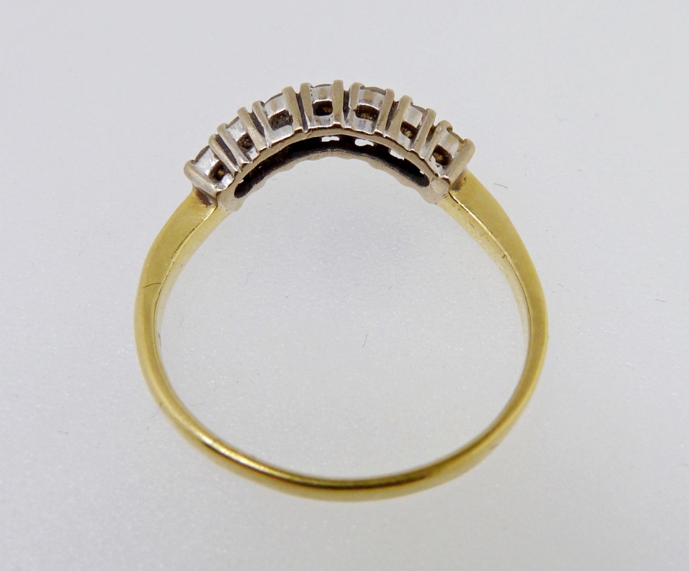 An 18 carat gold ring set curve of seven diamonds, size M - Image 4 of 4