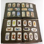 Two albums of mixed cigarette cards, mainly Will and Players plus five sets in their albums