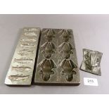 A frog chocolate mould marked Anton Reiche A.G. Dresden and 'Cladder and Jansen Amsterdam', 21.5 x