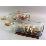 Two vintage model ships in bottles