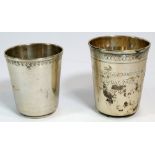 Two continental silver tumblers, one marked 800 the other 900 and engraved 'Ian Glover Glendenning