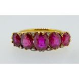 A Victorian gold ring set five graduated rubies interspersed with chip diamonds, size M, 5gm,