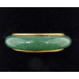 A 14ct gold jade ring