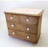 A Victorian pine chest of two short and two long drawers - distressed condition., 83 x 46 x 73cm