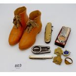 A group of collectables including Victorian pair of china boots, two penknives, three girl guide