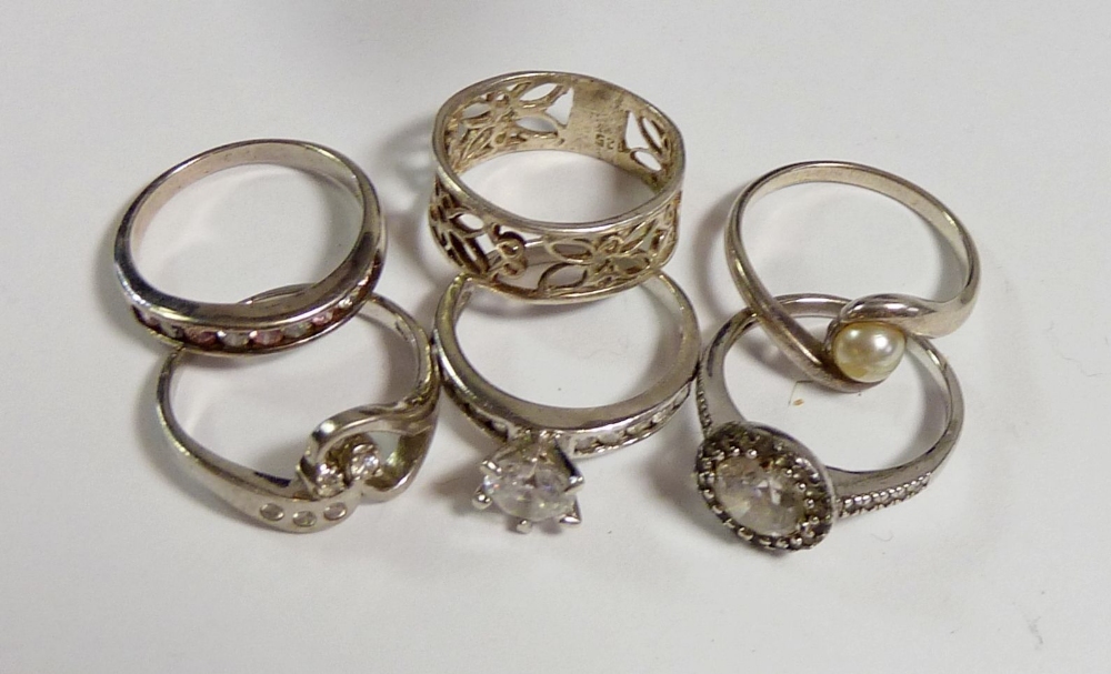 Six various silver rings