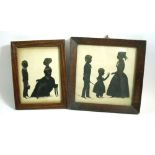 Two 19th century silhouette cutouts with gouache and pen and ink, largest measures 20 x 20 cm