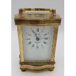 A French brass cased carriage clock, 12cm tall