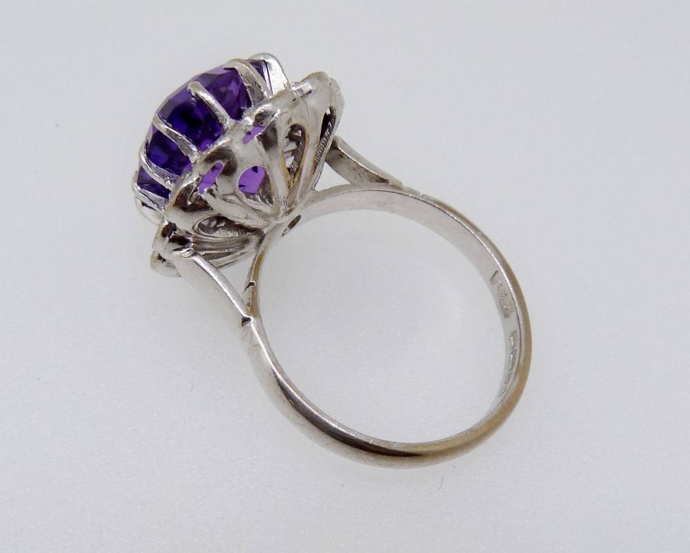 An 18 carat gold ring set cushion cut amethyst within diamond surround, size K-L, 6.4g - Image 3 of 4