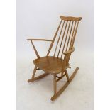 An Ercol beech rocking chair