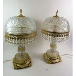 A pair of gilt metal and cut glass table lamps 42cm approx.