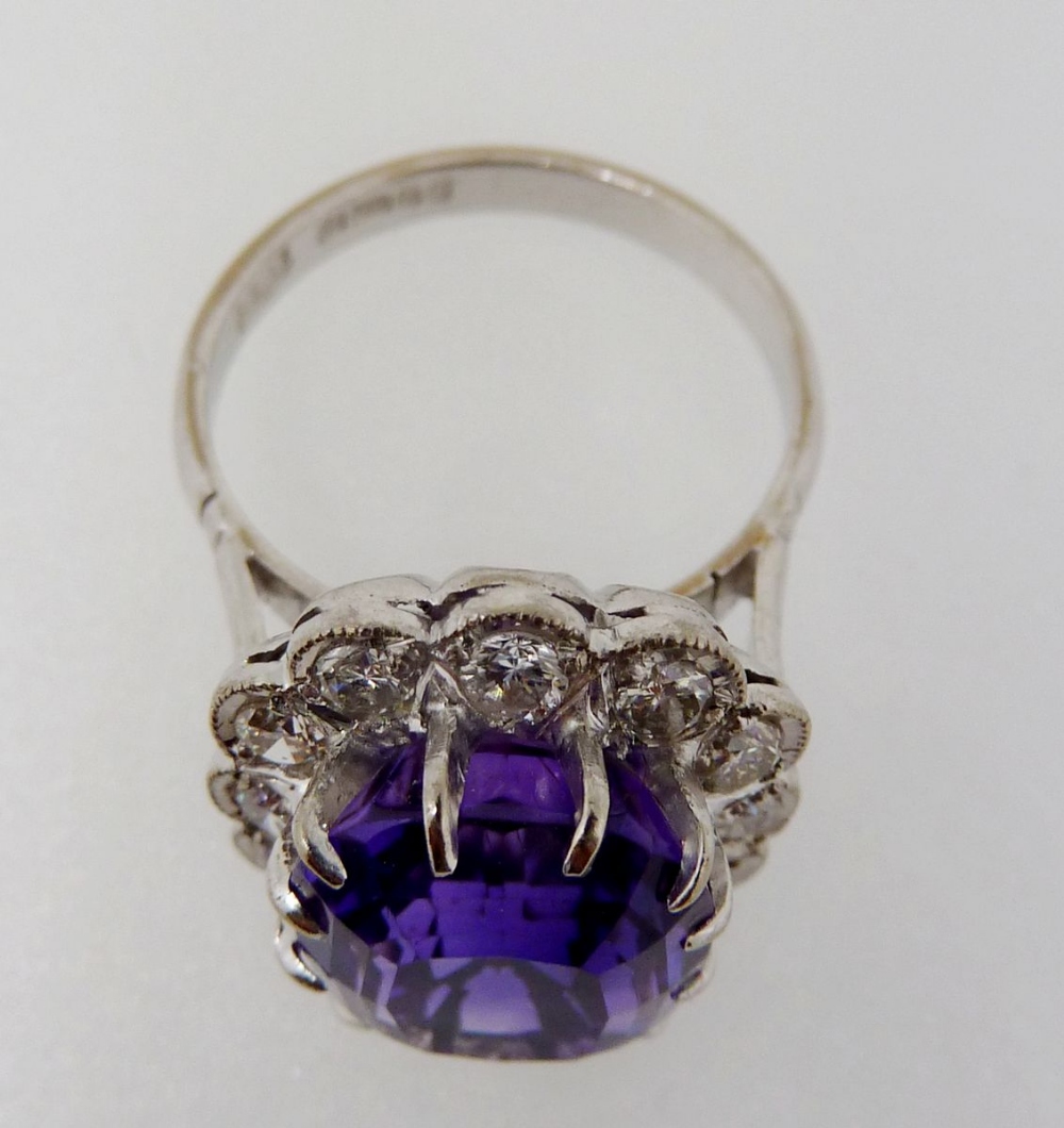An 18 carat gold ring set cushion cut amethyst within diamond surround, size K-L, 6.4g - Image 2 of 4