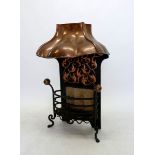 An Art Nouveau copper and cast iron fire grate with embossed decoration to copper hood, 104 x 62cm