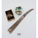 An enamel floral box, silver plated paper knife and a Consul Amor perfume atomiser in the form of