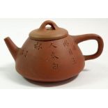 A Japanese red stoneware teapot
