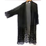 A 1920's black Georgette and lace long evening jacket