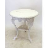 A Victorian cast iron circular bar or garden table with mask decoration and painted wooden top, 64cm