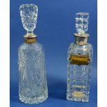 Six various cut glass decanters including two silver plated collars