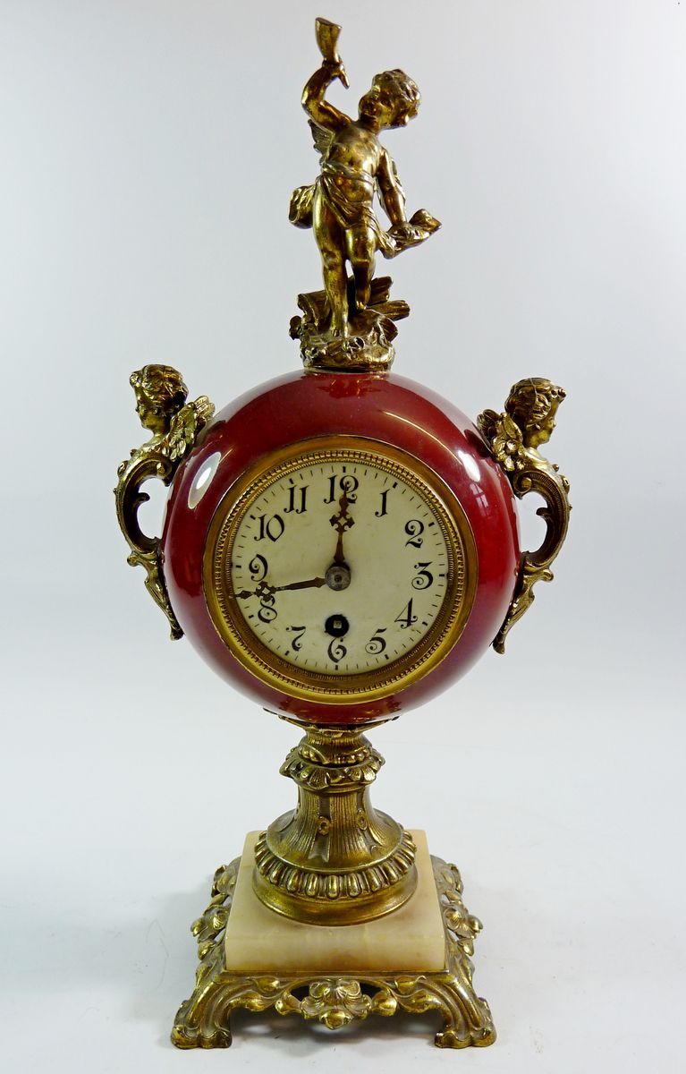 A French spherical clock with cherub surmount 43cm high