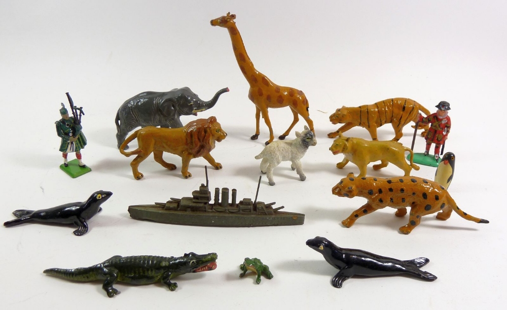 A group of antique painted lead and metal toy wild animals