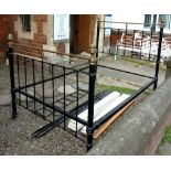 An Edwardian Art Nouveau brass and iron double bed, 140cm wide