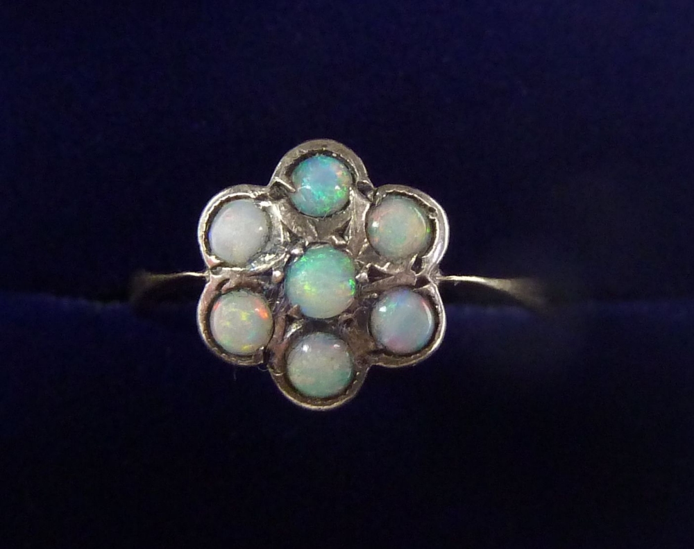 A silver and 9 carat gold opal cluster ring, size L