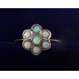 A silver and 9 carat gold opal cluster ring, size L
