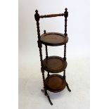 An oak folding cake stand on turned supports, 91 cm total height