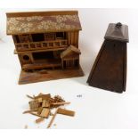 A wooden model house with painted decorated, 22cm tall