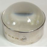 A silver mounted large magnifying lens, 9cm diameter
