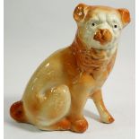 A Victorian Stafforshire pug dog (repaired) 17cm tall