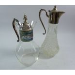 Two glass and silver plated claret decanters